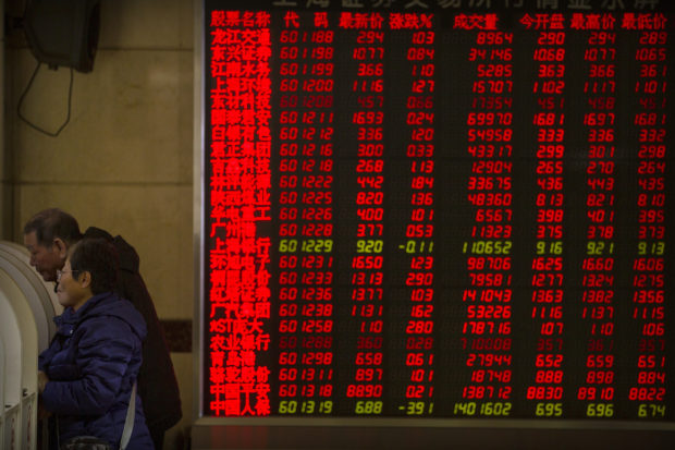 World shares retreat on jitters over US bill on Hong Kong