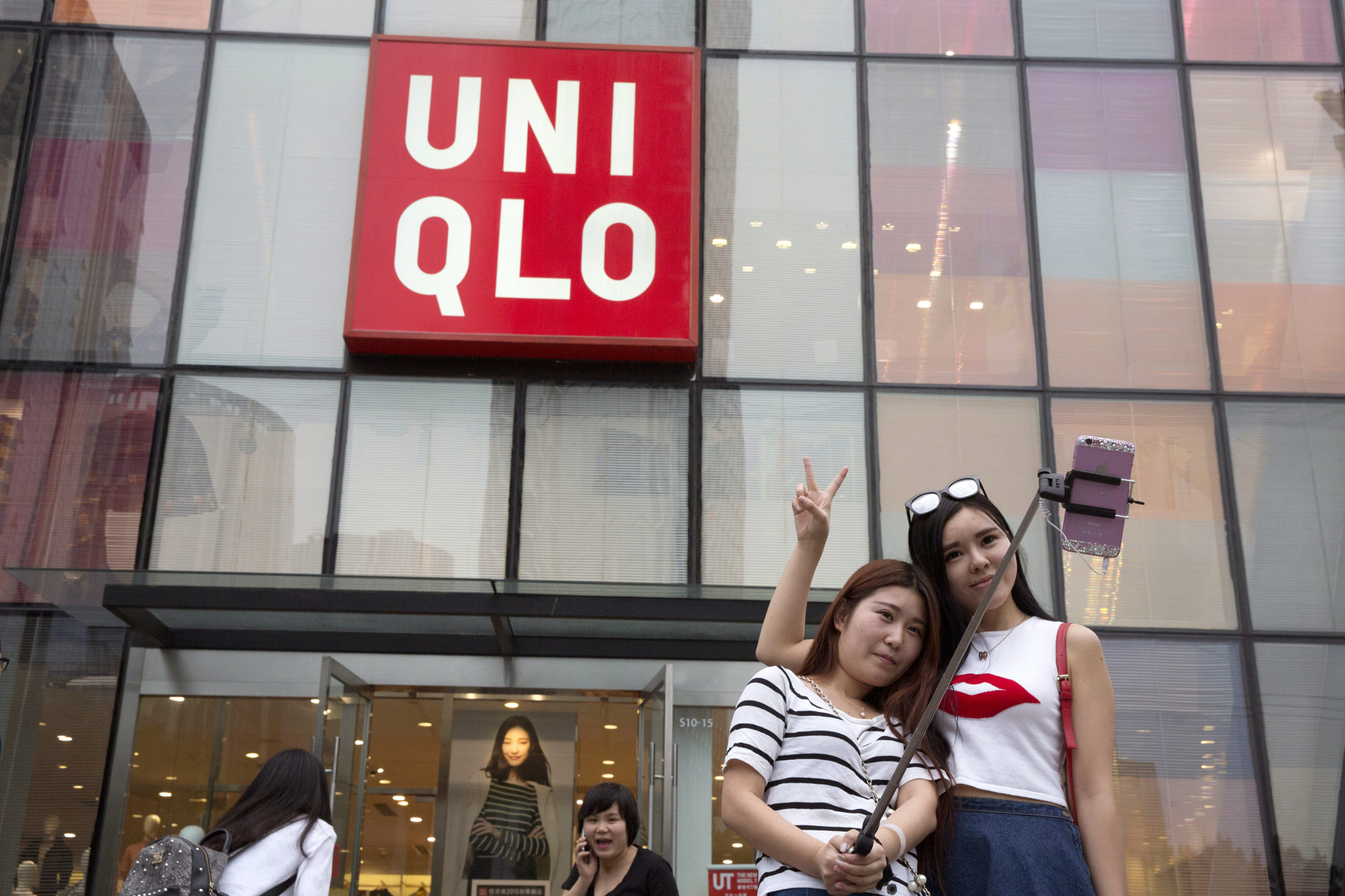 Car makers adjust to virus outbreak, Uniqlo outlets closed