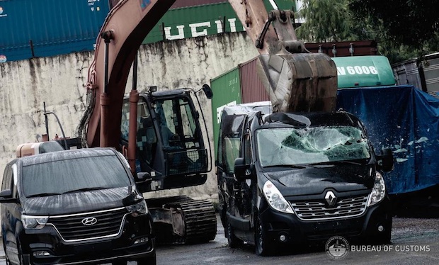 Forfeited vehicles being destroyed at Bureau of Customs