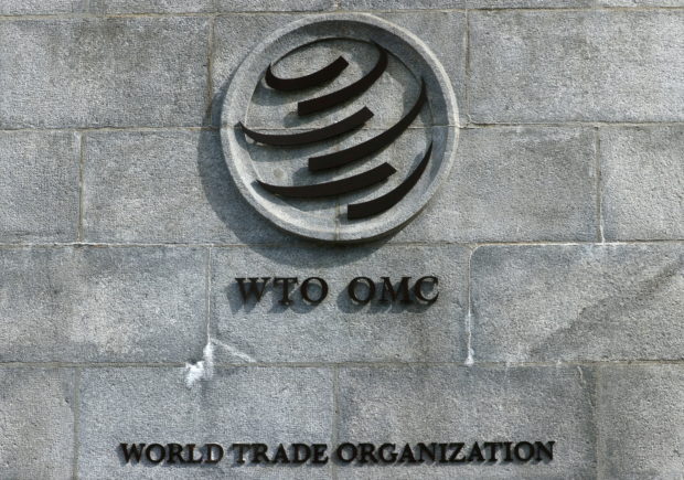 FILE PHOTO: A logo is pictured outside the World Trade Organisation (WTO) in Geneva, Switzerland, September 28, 2021. REUTERS/Denis Balibouse