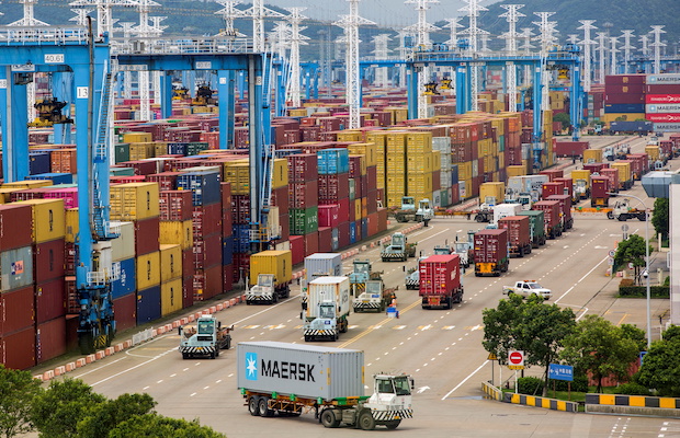 Lines of trucks are seen at a container terminal of Ningbo Zhoushan port