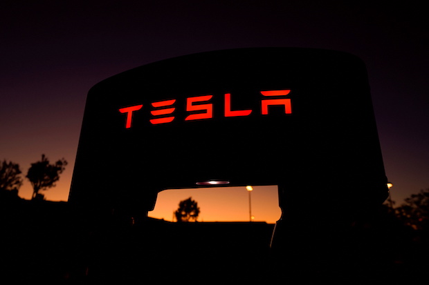 A Tesla supercharger is shown at a charging station in Santa Clarita, California
