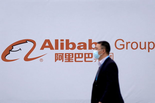 FILE PHOTO: A logo of Alibaba Group is seen during the World Internet Conference (WIC) in Wuzhen, Zhejiang province, China, November 23, 2020. REUTERS/Aly Song/File Photo