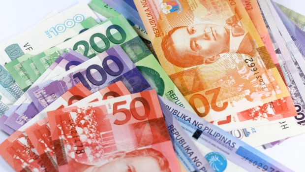 Philippine peso bills. STORY: Peso seen sinking to new record low in Q1 2023