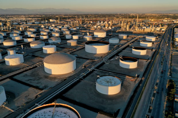 Storage tanks are seen at Marathon Petroleum's Los Angeles Refinery. STORY: Oil climbs above $121 a barrel as China eases curbs, EU meets