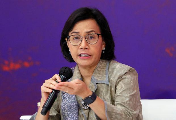 FILE PHOTO: Indonesia's Finance Minister Sri Mulyani Indrawati speaks during a side event on the G20 Finance Ministers and Central Bank Governors Meeting in Nusa Dua, Bali, Indonesia, 14 July 2022. Made Nagi/Pool via REUTERS
