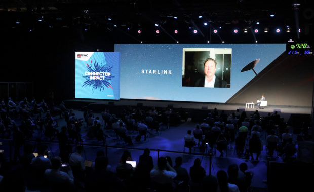 Elon Musk on screen through Starlink. STORY: Henry Sy Jr., Elon Musk team up for PH satellite internet