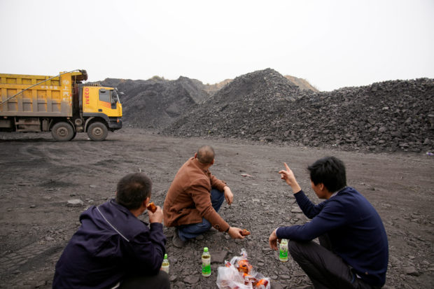 coal truck drivers take a break 