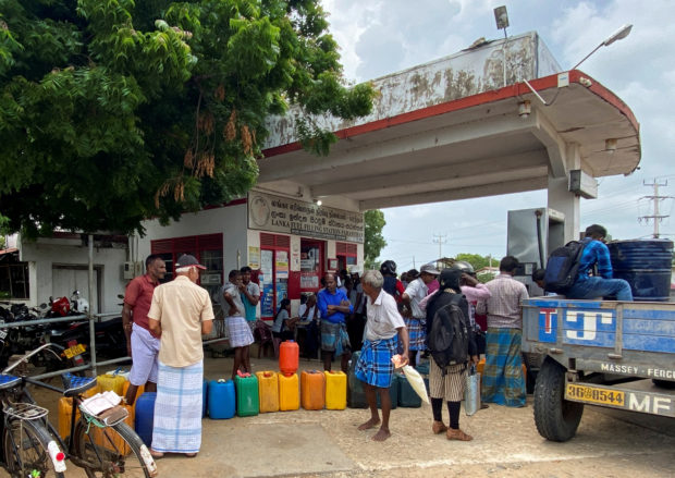 People lining up to buy fuel