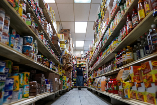 A woman shops for groceries