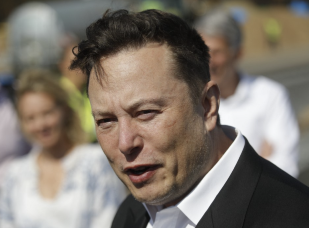 (FILES) In this file photo taken on September 03, 2020 Tesla CEO Elon Musk talks to media as he arrives to visit the construction site of the future US electric car giant Tesla, in Gruenheide near Berlin. Elon Musk has sold nearly $7 billion worth of Tesla shares, according to legal filings published August 9, 2022, amid a high-stakes legal battle with Twitter over a $44 billion buyout deal. Odd ANDERSEN / AFP