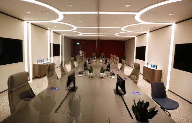 A  meeting room outfitted with airtight glass panels