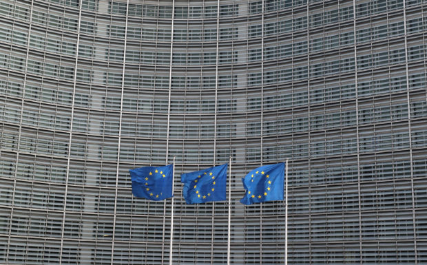 European Union flags fly outside the European Commission HQ in Brussels