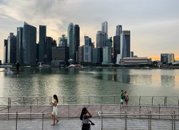 People take selfies with Singapore CBD in the background