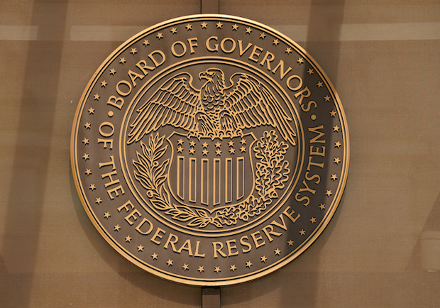 sign for the Federal Reserve Board of Governors 
