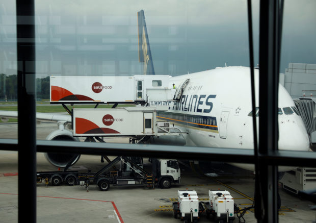 SATSFood Services restock a Singapore Airline plane 