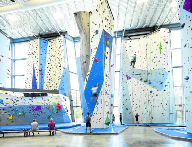 The rock climbing walls of Allez-Up were designed to bring to mind sugar and candy as a homage to the facility’s original use as a sugar refinery.
