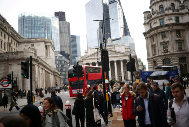 People walking through London financial distrcit
