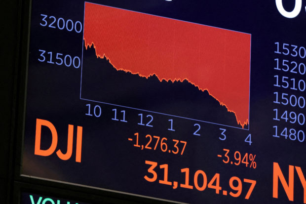 Dow Jones Industrial Average shown on a screen at NYSE trading floor