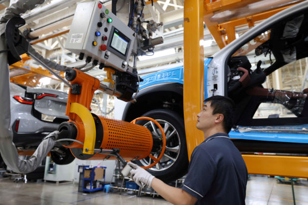 Worker at production line of Nio electric vehicles
