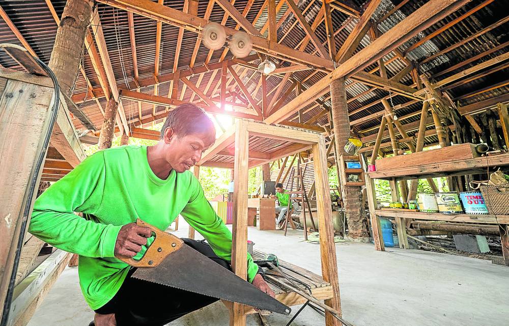 At South Farm, workers build furniture, signages for sister resort, South Palms