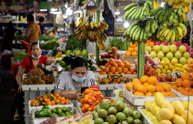 Fruit vendor in public market in Quezon City