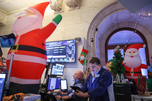Traders work on the trading floor of the NYSE