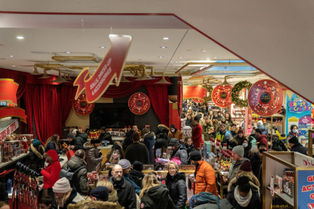 People shop on Christmas eve in New York City