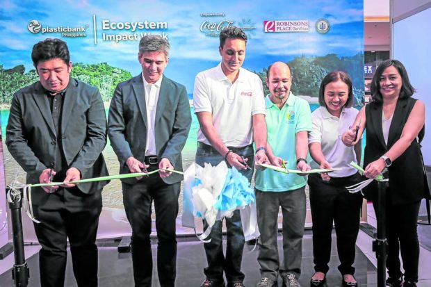 Coca-Cola Philippines, together with Plastic Bank, officially opened the Ecosystem Impact Week on World Oceans Day in Robinsons Place General Trias on June 8 with a public exhibit on their waste collection initiatives, including a collection booth, where mallgoers can bring clean and used plastic bottles for recycling. —contributed photos