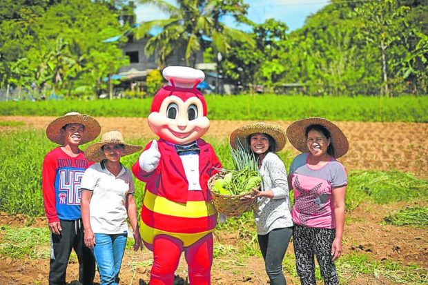SUPPLY CHAIN   Jollibee Group Foundation has been supporting Filipino farmers through training programs and market access initiatives. —CONTRIBUTED PHOTO