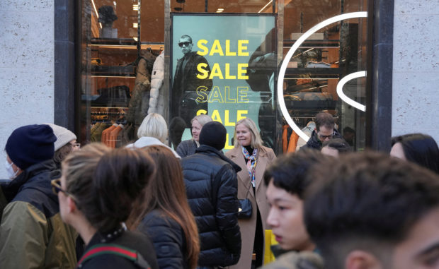 People shopping during traditional Boxing Day sales in London