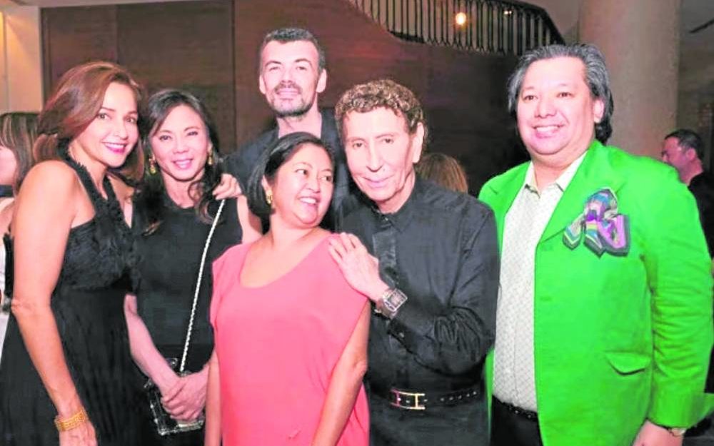 Arcache (fifth from left) with Maricris Zobel, Vicki Belo, Xavier Btesh, Liza Marcos, Matti in this 2014 photo         