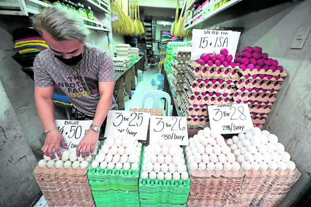 RETAILER An egg vendor at the Marikina City public market —GRIG C. MONTEGRANDE