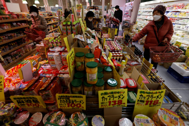 Shoppers at a supermarket in Tokyo