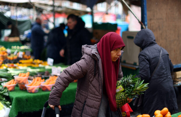 Woman in Lewisham Market, south east London