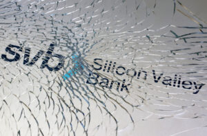 SVB logo seen through a broken glass
