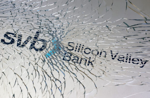 SVB logo seen through a broken glass