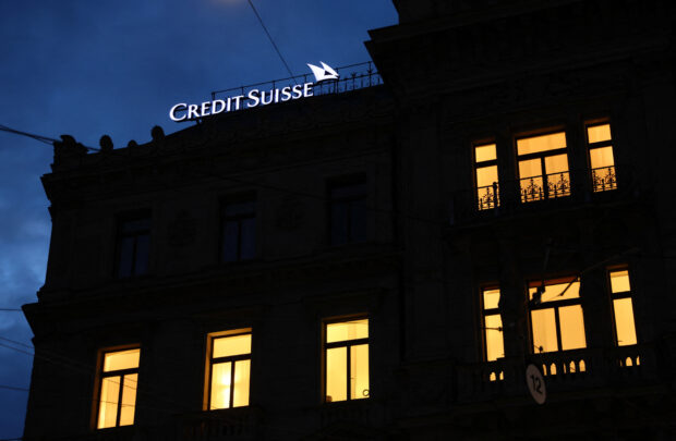 Logo of Credit Suisse on top of its HQ in Zurich