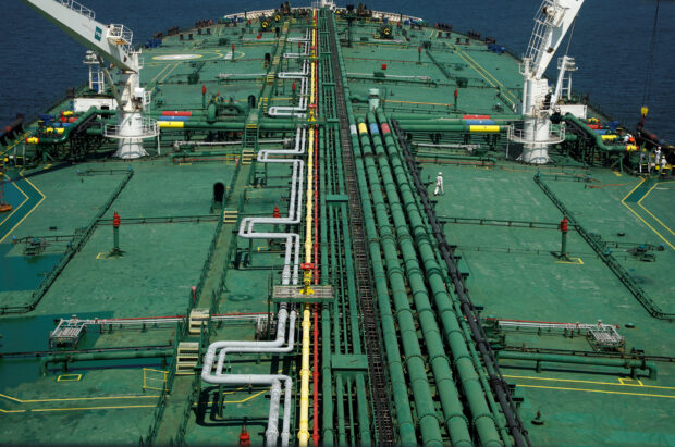 Pipelines run down the deck of Hin Leong's Pu Tuo San VLCC supertanker