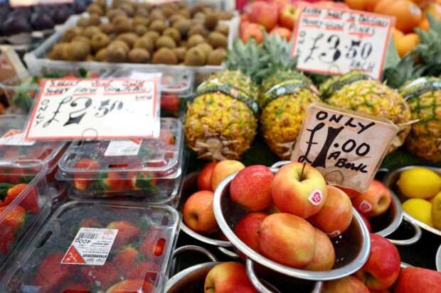 Fruits are displayed on sale in Lewisham Market in London