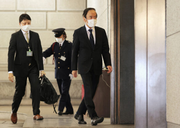 New Bank of Japan Governor Kazuo Ueda arrives at BOJ HQ on his first day in office
