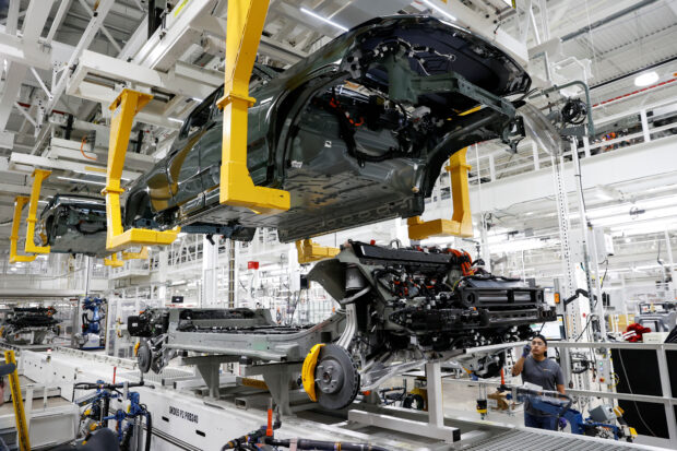 An assembly line at start up Rivian Automotive's electric vehicle factory in Illinois