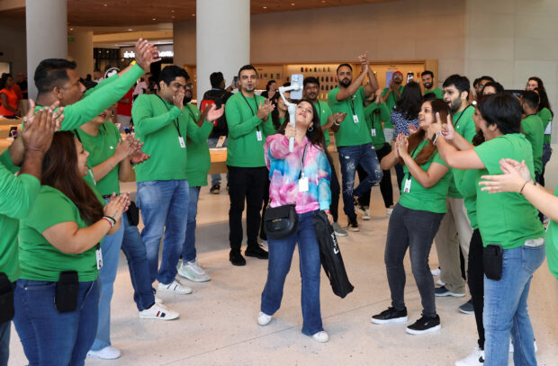 Apple employees welcoming guests to India's first Apple retail store