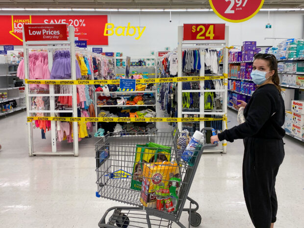 A woman shopping at a Walmart store in Toronto