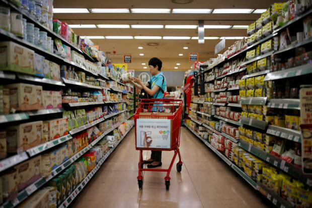 A woman shopping at a supermarket in Seoul
