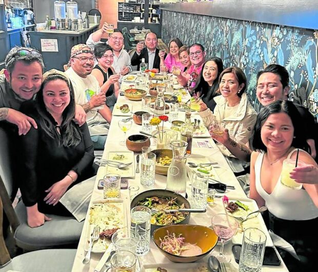 The author (fourth from right) breakingbread with Filipino chefs in DMV. 