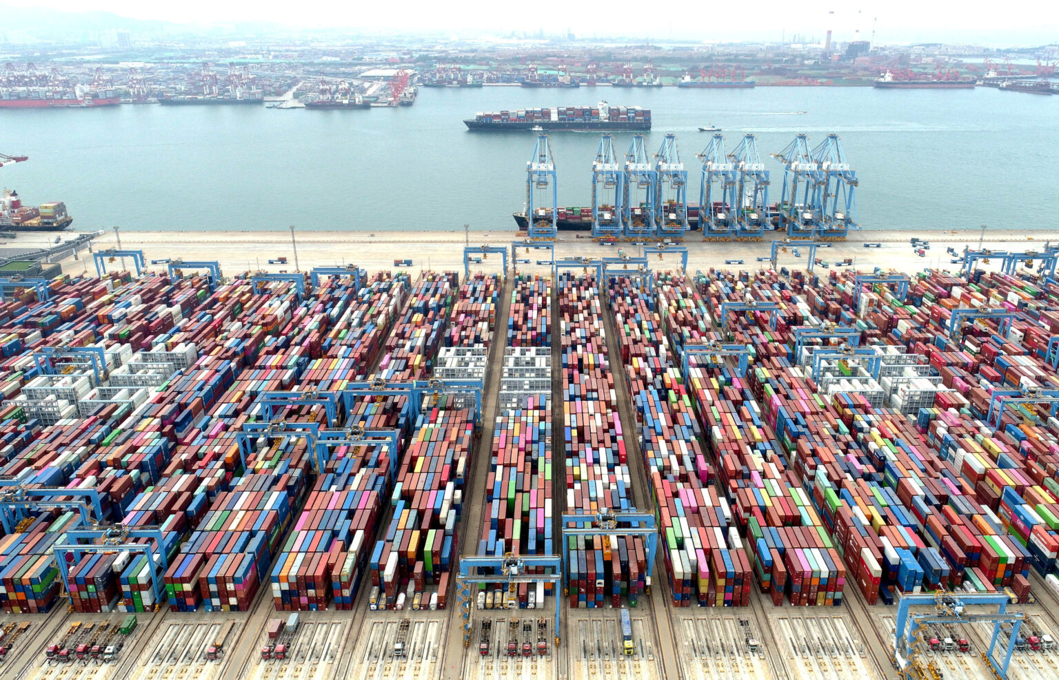 Containers and cargo vessels at Qingdao port in Shandong province