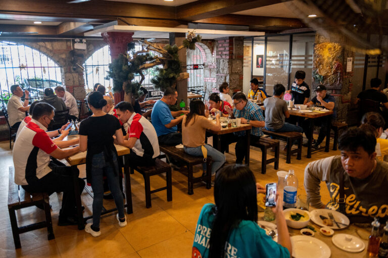 People eat a restaurant in Quezon City