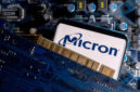 Smartphone displaying Micron logo