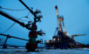 A well head and drilling rig in Yakarta oilfield in Russia